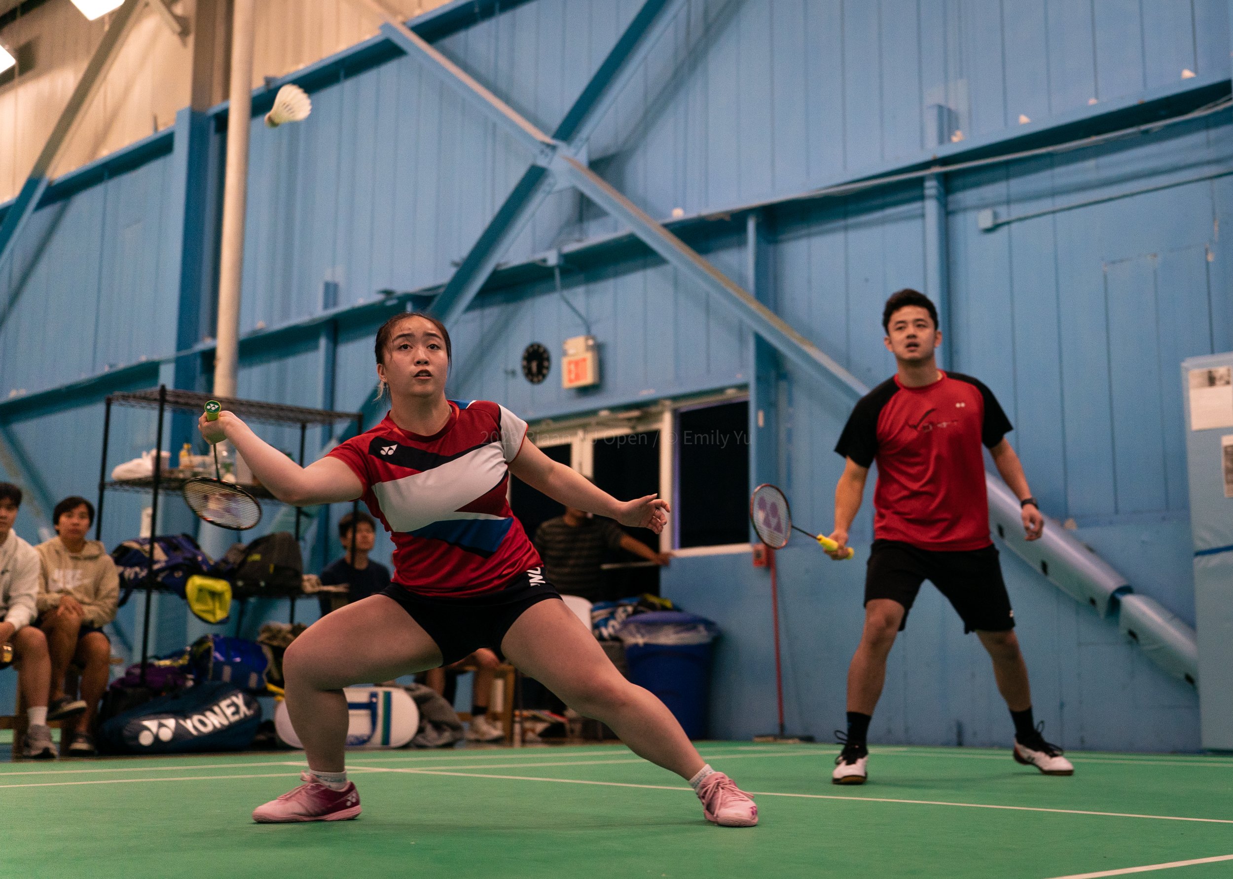 Badminton match action shot